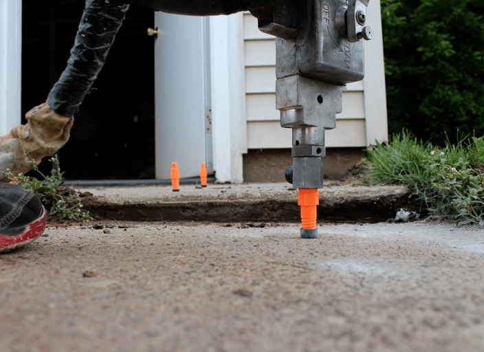 Concrete lifting and leveling by Foundation Werks in McKinney, Texas, offering trusted repair solutions with a warranty.